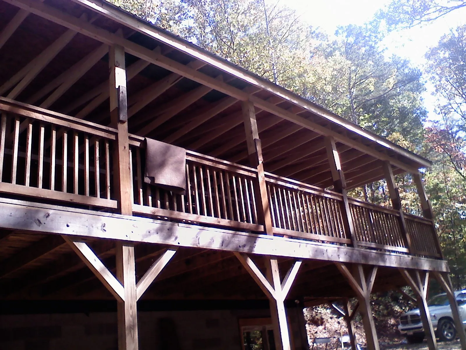 Timber framing under a new elevated porch and deck — Roof Leak Repair in Mountlake Terrace by Roofing Brothers